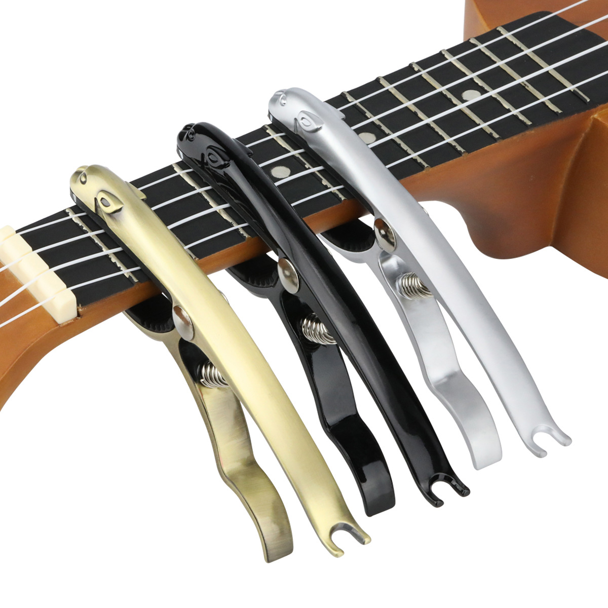 プロフェッショナルメタルギターカポアルミ合金クランプキートリ - Guitar Tuner Clip のレビューと価格